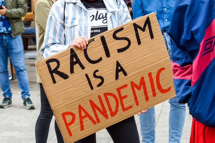 Racism is a pandemic sign